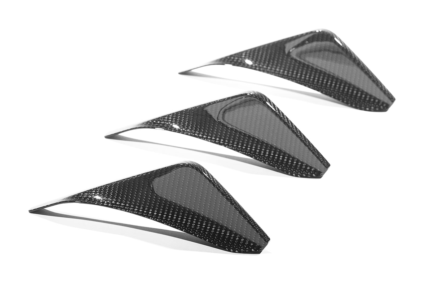 three elements of black diffuser on a white background
