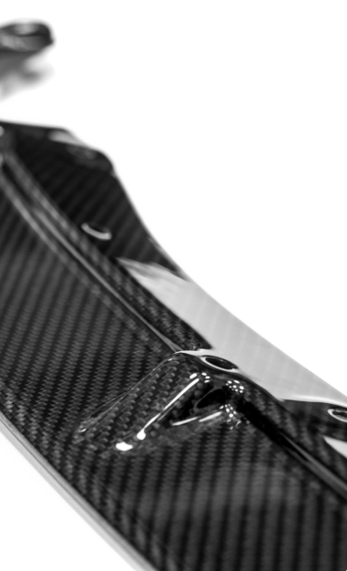 black carbon fibre element on white background